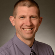 Headshot of Adam Powell.