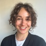 headshot of Caroline Taverna.