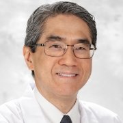 Headshot of Eric Wong.
