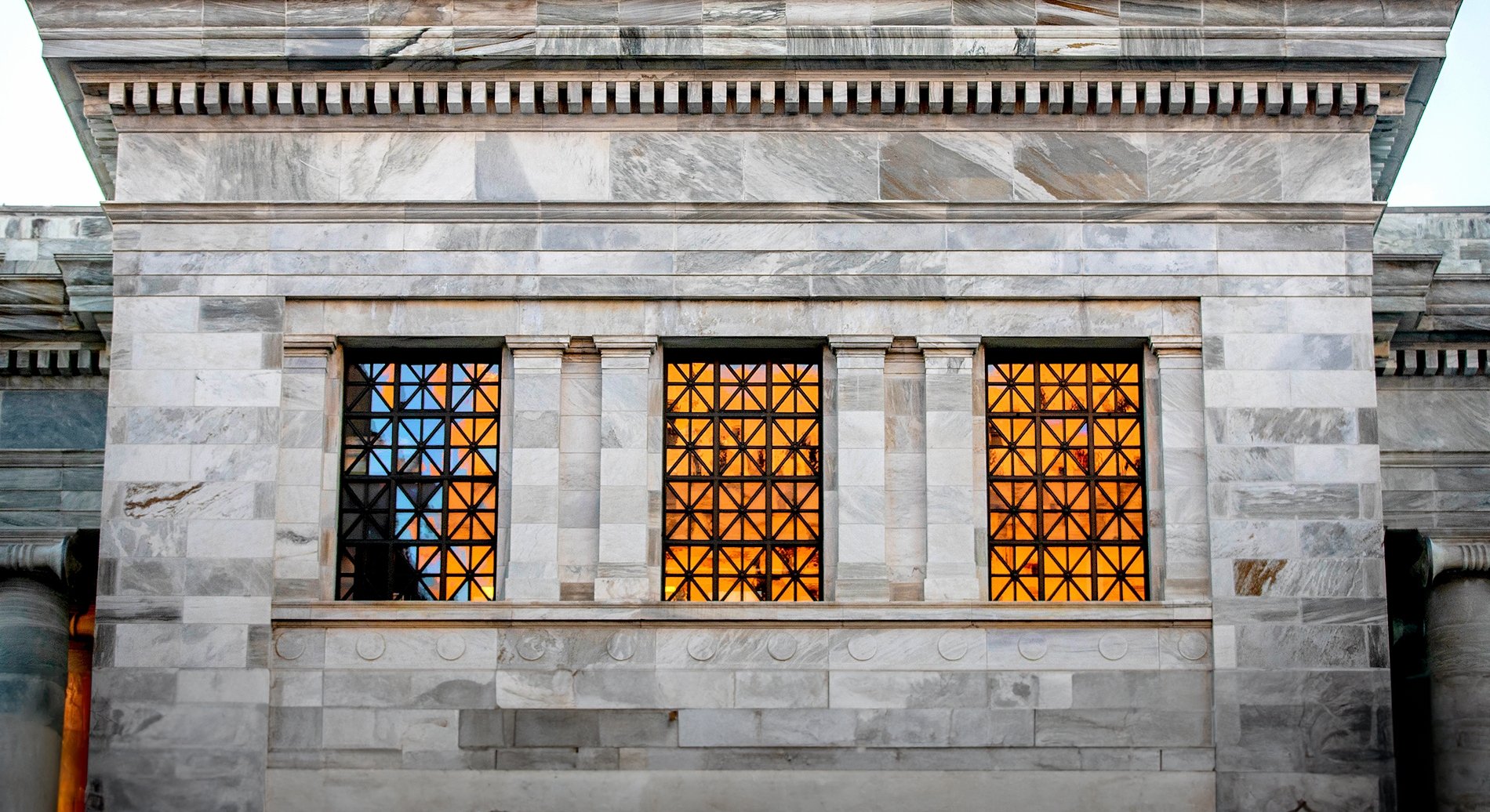 Orange reflection on windows of Gordon Hall.