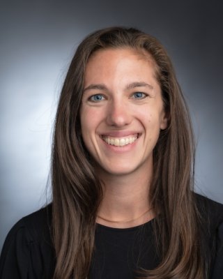 HEADSHOT OF KATE SCIACCA.