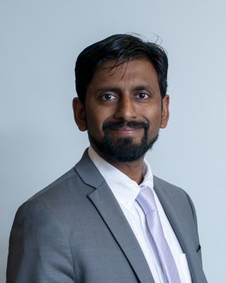 headshot of Dr Mehta.