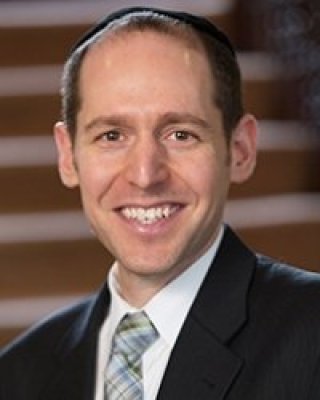 Headshot of David Rosmarin.