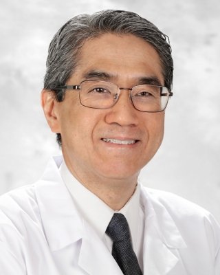 Headshot of Eric Wong.
