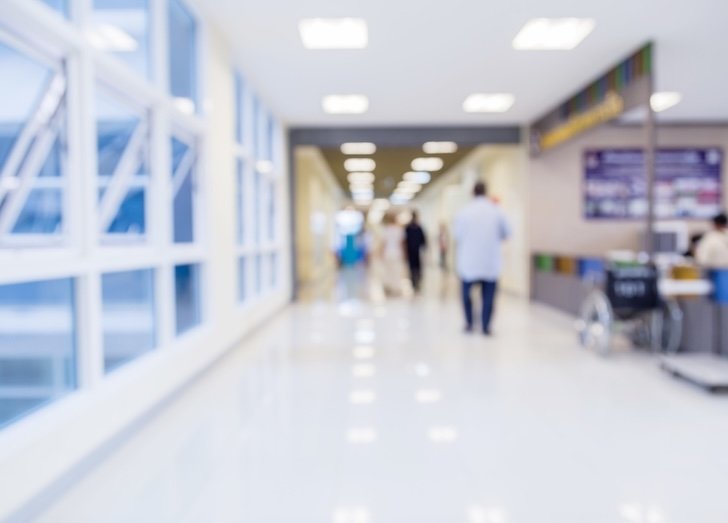 A blurry hallway in a hospital.