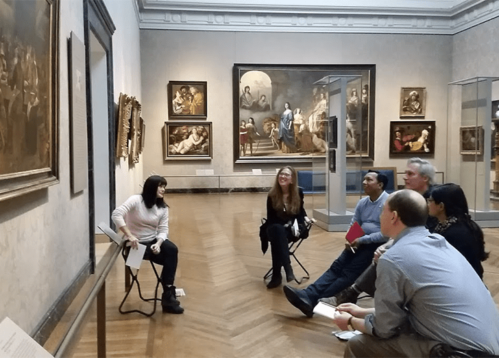 Program participants viewing art in a museum.