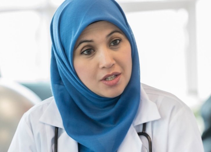 A woman in a hijab.
