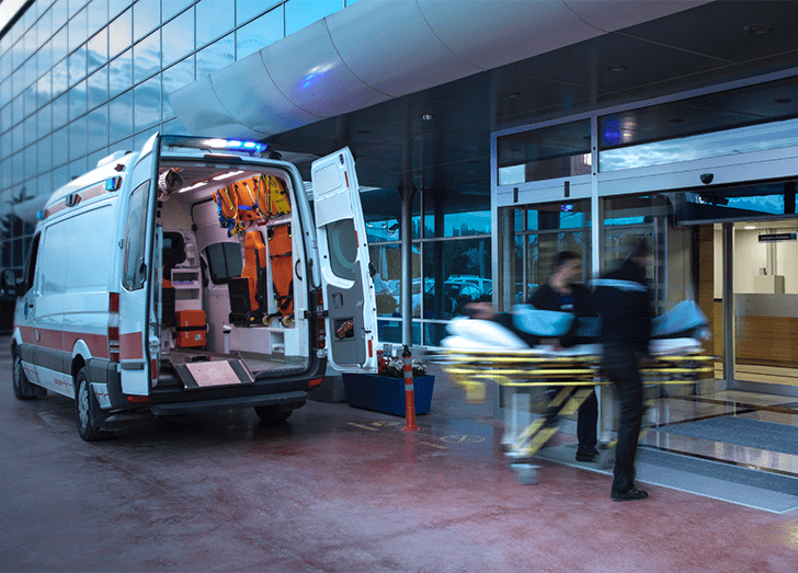Emergency doctors in front of hospital.
