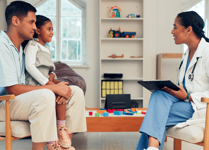 Healthcare, father and child with therapist for consultation, development and behavior progress for checkup.