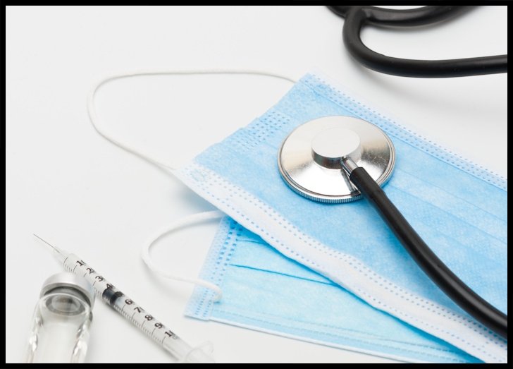 Medical masks, vial and syringe, stethoscope