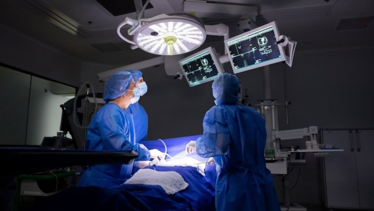 Doctors performing surgery.