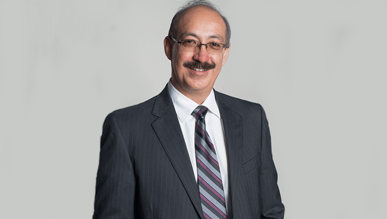 A. Enrique Caballero headshot.
