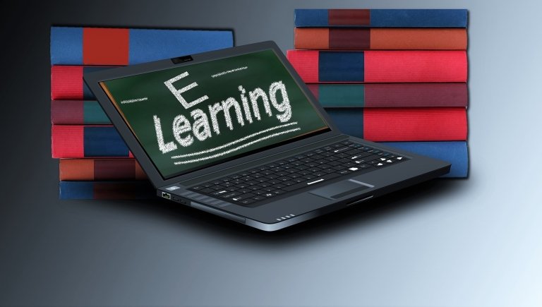 A computer screen displaying the text "E-learning." 
