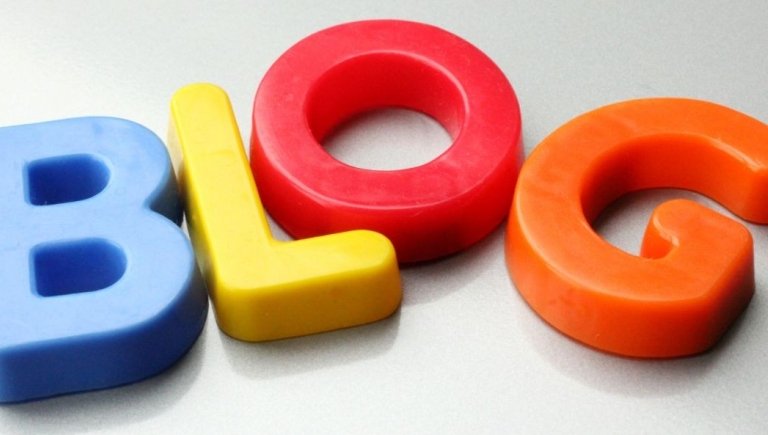 Four colorful letters arranged to spell the word blog. 