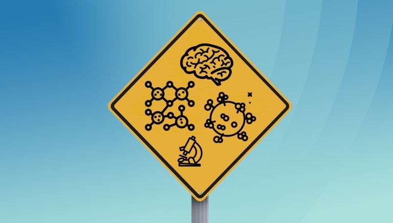 A road sign with health icons on it.