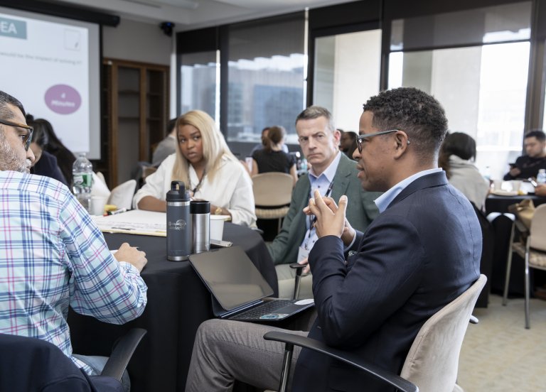 A group of executives in a custom program. 