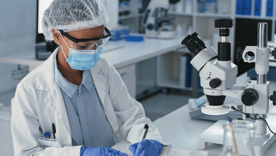 female scientist taking medical notes.