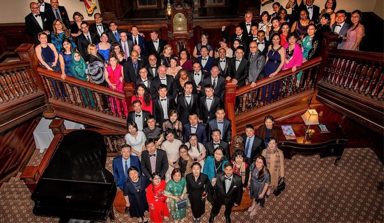 SQIL graduates with faculty after their gala dinner and completion ceremony in Boston.