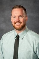 headshot of Justin Fedoryk.