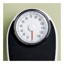 Black bathroom analog scale with large white dial face