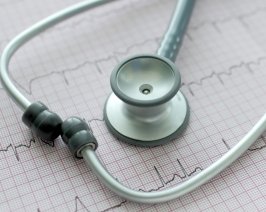 A stethoscope on an EKG readout